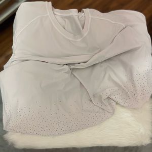 White lululemon crossback shirt.